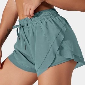 Athletic shorts, sheer lining